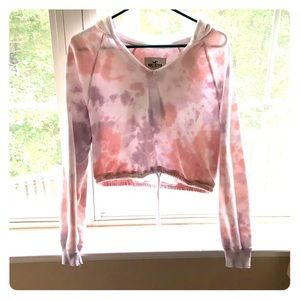 A tie-dye crop top hoodie.